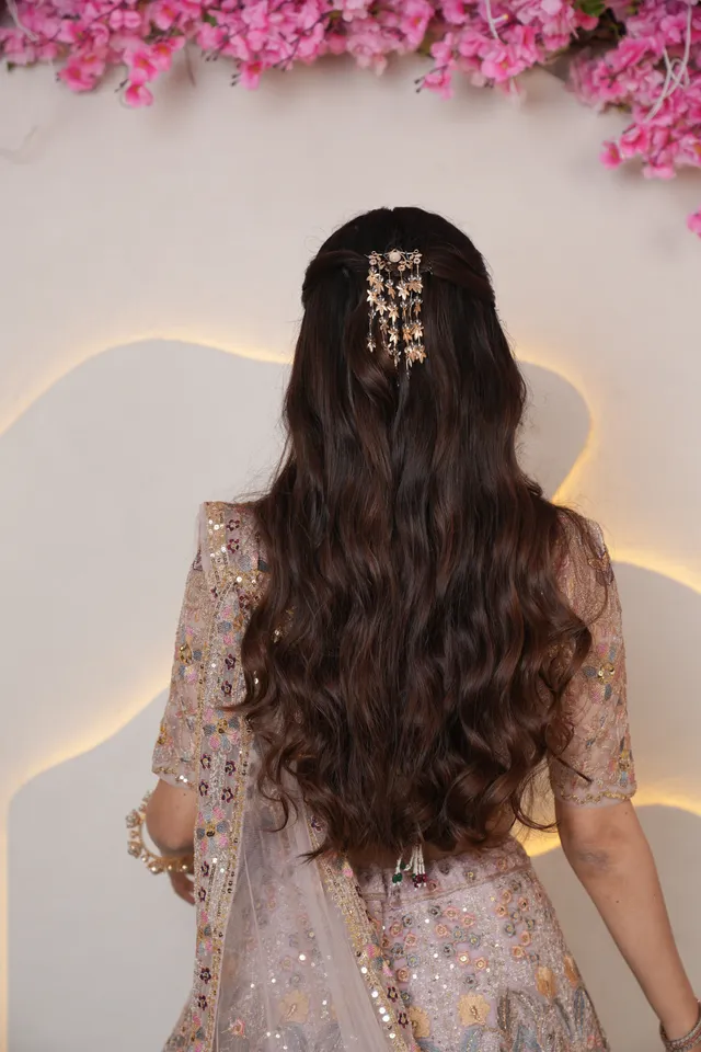 Voluminous red-carpet Hollywood waves styled with high-gloss mirror shine