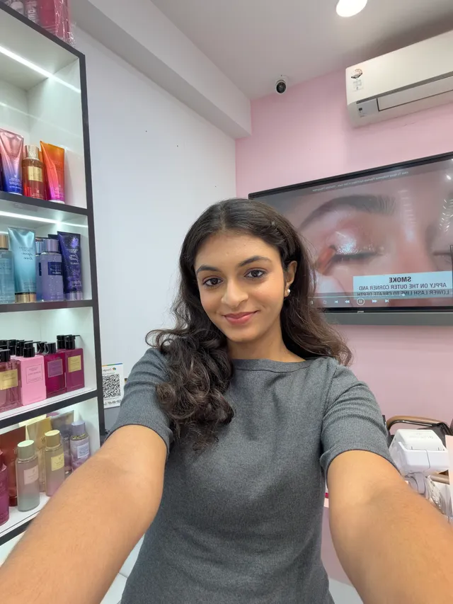 Students practicing personal foundation matching and eye makeup during self grooming workshop